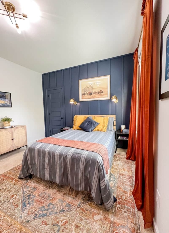 Navy Blue Board and Batten Bedroom Wall with Burnt Orange Accents