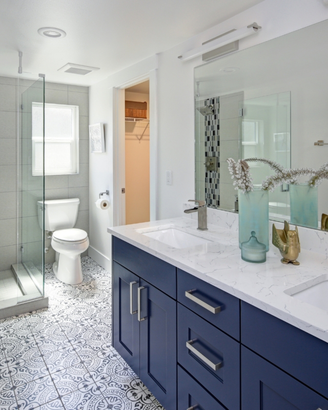 Navy Blue Double Vanity with Patterned Floor Tile