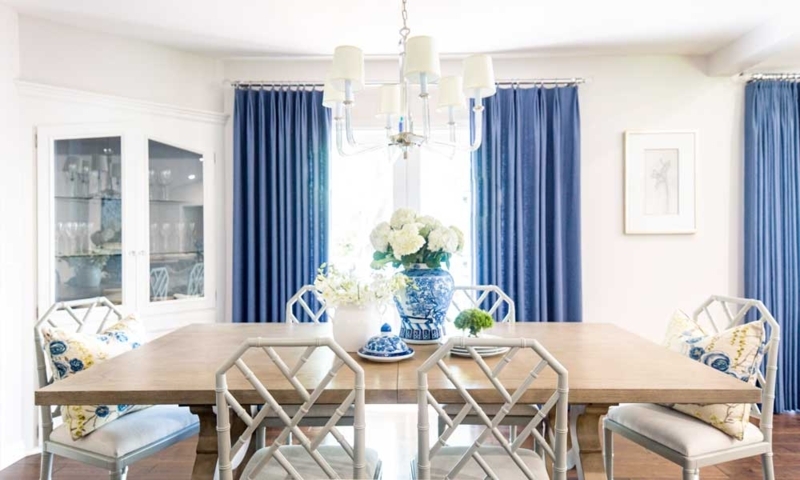 Navy Curtains in Coastal Dining Room with White Lattice-Back Chairs