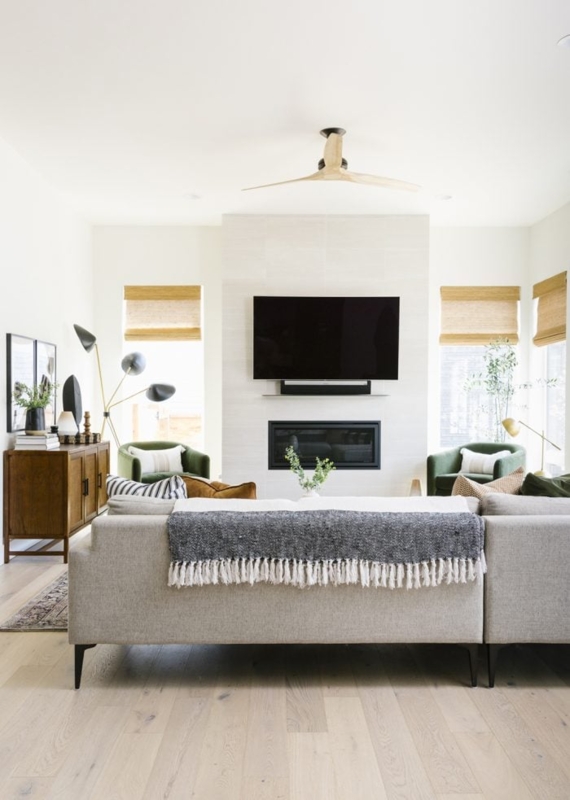 Neutral Living Room with Green Accent Chairs & Tiled Fireplace