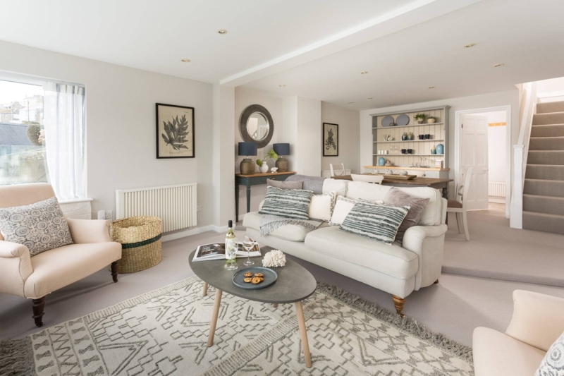 Neutral Open Concept Living Room with Geometric Rug Styling