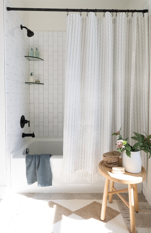 Neutral Woven Fabric Shower Curtain with Matte Black Fixtures