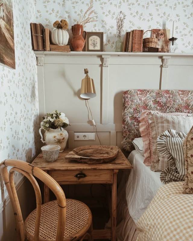 Nightstand and Cane Chair with Vintage Shelf and Leaf Wallpaper