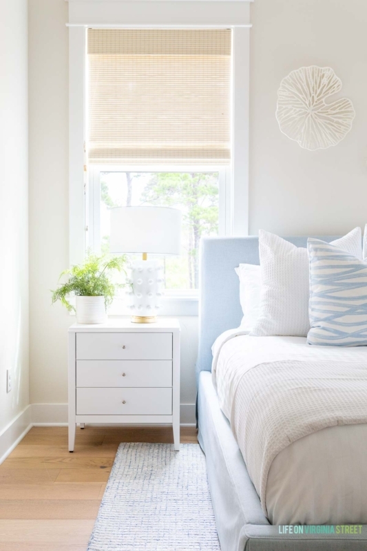 Nightstand with Bobble Lamp Base and Woven Roman Shade Decor