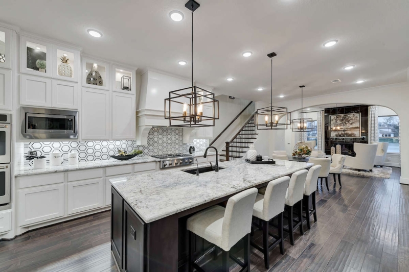 Open-Concept Kitchen Layout with Hexagon Backsplash & Dark Island