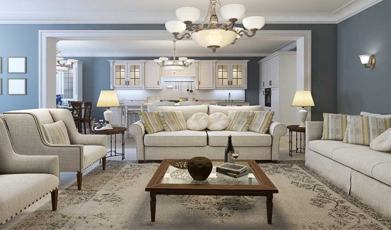 Open Concept Living Room with Slate Blue Walls and Symmetrical Seating