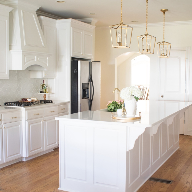 Open Concept White Kitchen with Large Island and Breakfast Bar