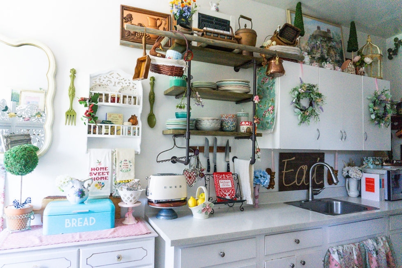 Open Pipe Shelving Kitchen With Vintage Blue Bread Box