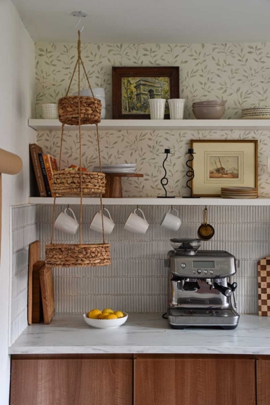 Open Shelving against Botanical Wallpaper and Vertical Finger Tiles