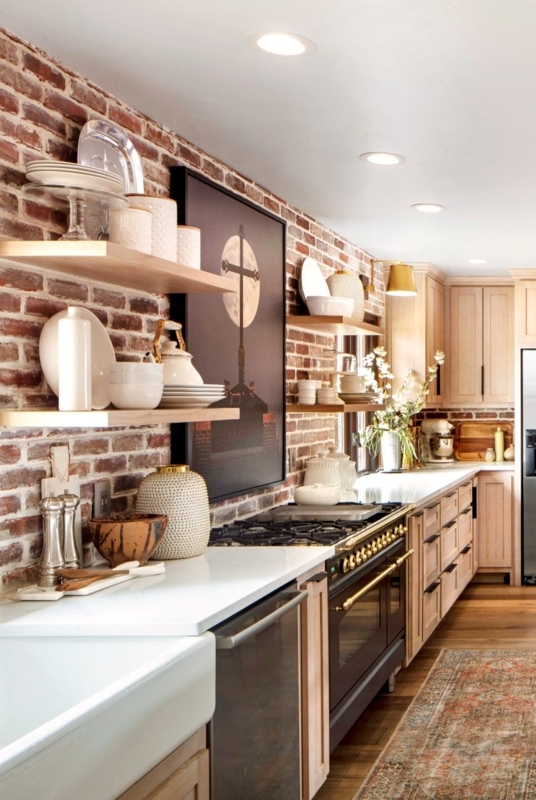Open Shelving on Brick Backsplash with Black Professional Range