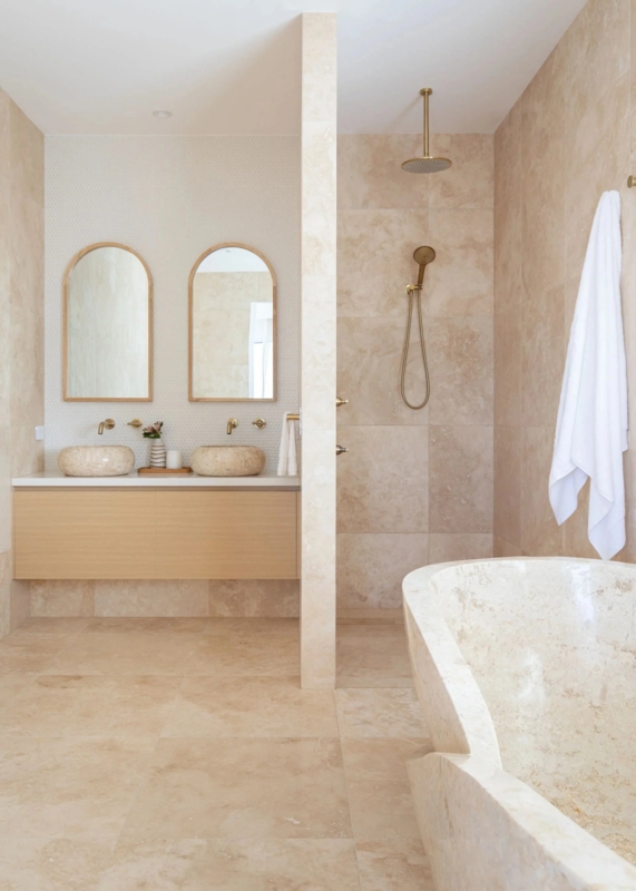 Organic Modern Ensuite with Travertine Style Tiles and Wood Vanity
