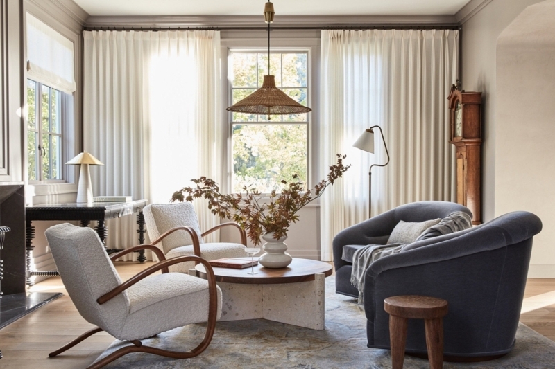 Organic Pleated Drapes with Bouclé Accent Chairs