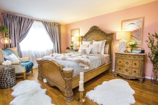 Ornate Carved Wood Bed Frame against Blush Pink Bedroom Walls
