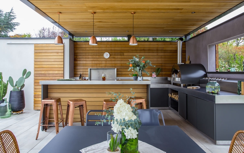 Outdoor Bar with Copper Stools, Wood Slat Ceiling & Pizza Oven