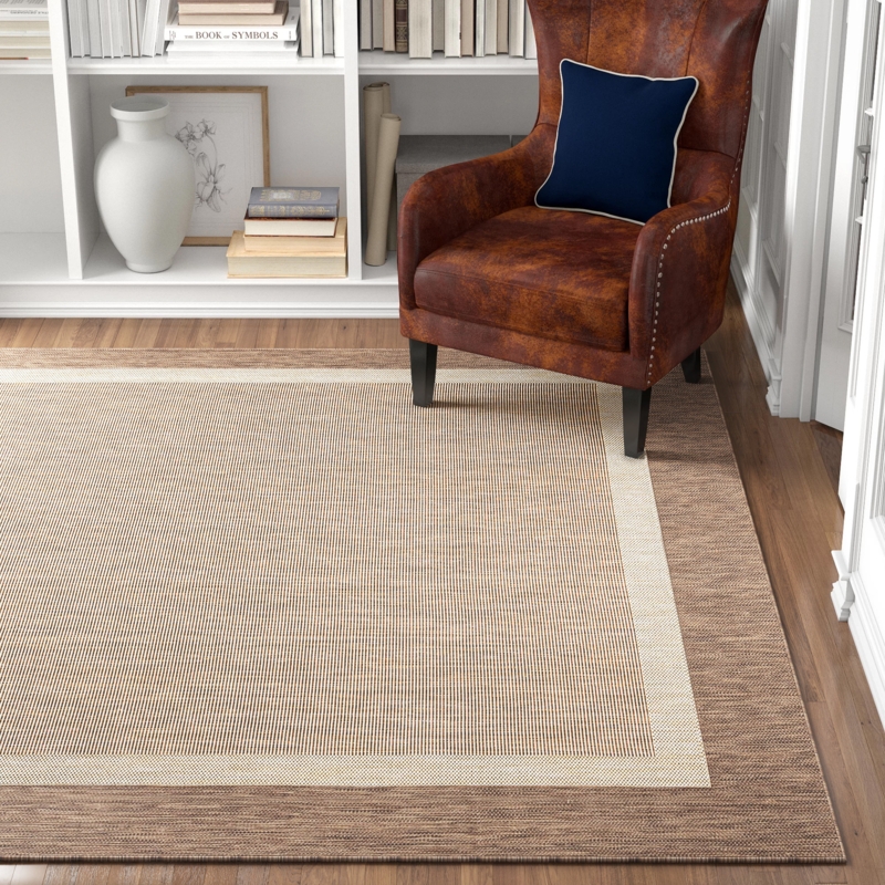 Outdoor Rug: Golden Brown Stripes and Flatweave Texture for Deck