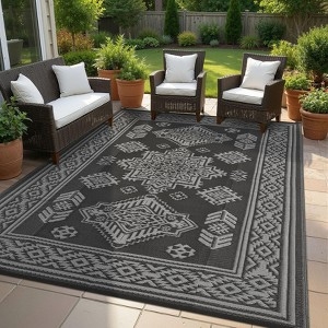 Outdoor Rug: Reversible Diamond Pattern, Waterproof, Black & Grey.