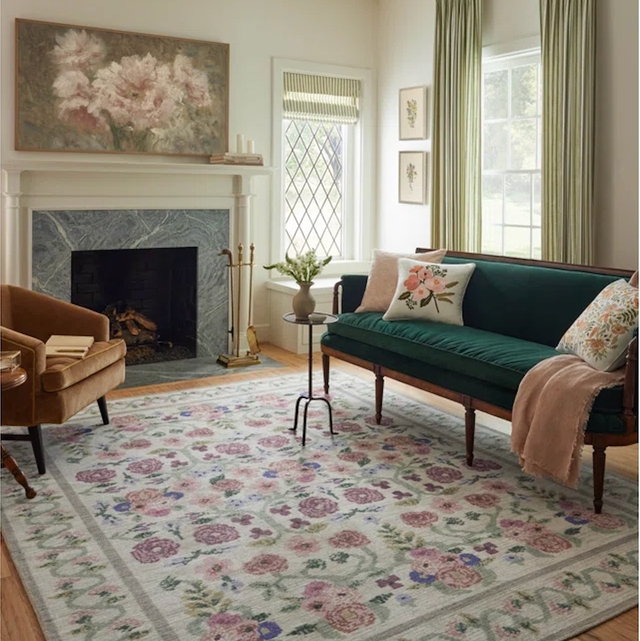 Oversized Floral Print Area Rug in a Traditional Parlor with Green Sofa.