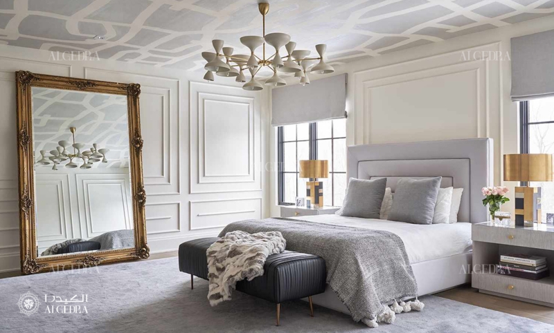 Oversized Ornate Gold Mirror with Geometric Patterned Ceiling