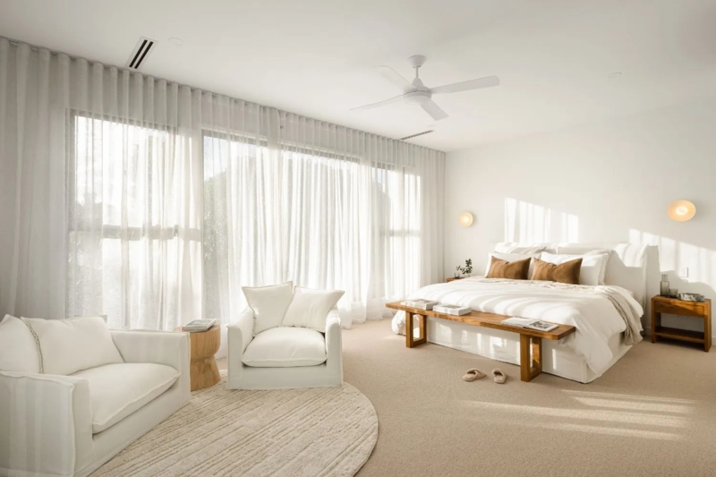 Pair of Oversized Accent Chairs in a Minimalist Bedroom