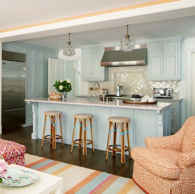 Pale Blue Kitchen with Bamboo Bar Stools and Crystal Pendant Lights.