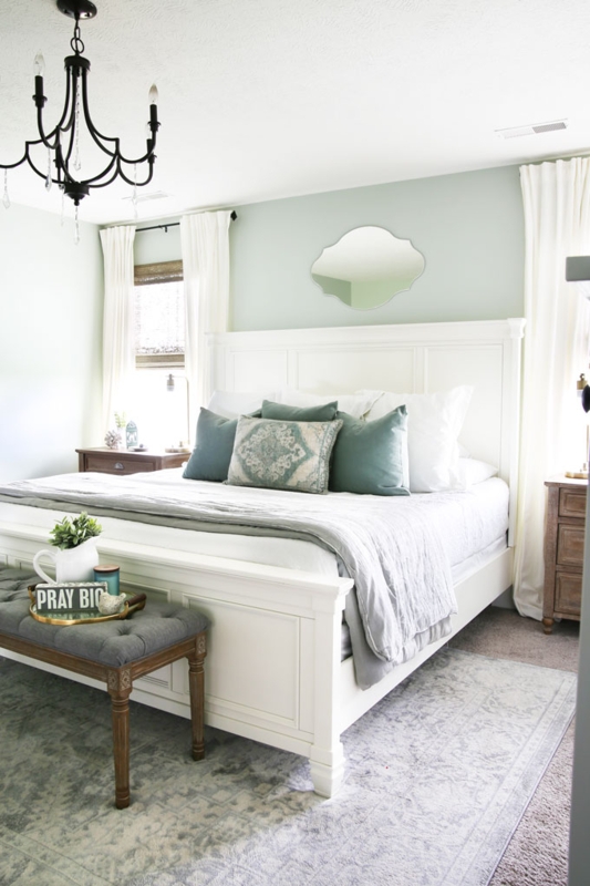 Paneled Bed in Sage Green Bedroom with Tufted Bench