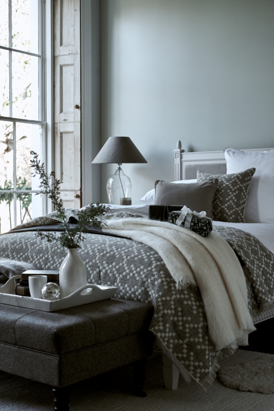 Patterned Bedding Bed with Tufted Ottoman & Wood Shutters
