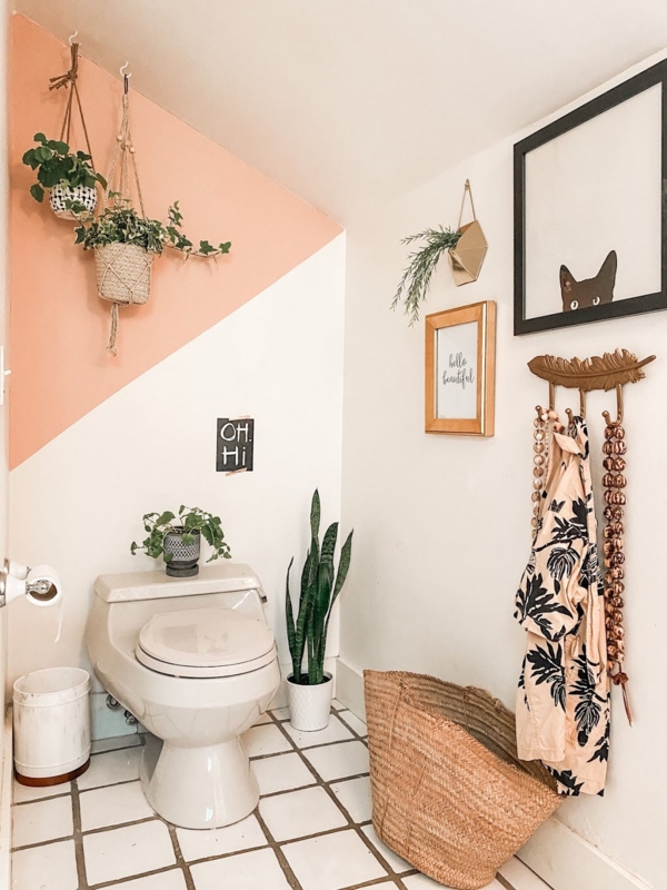 Peach Color Block Wall in Boho Bathroom with Woven Basket Storage