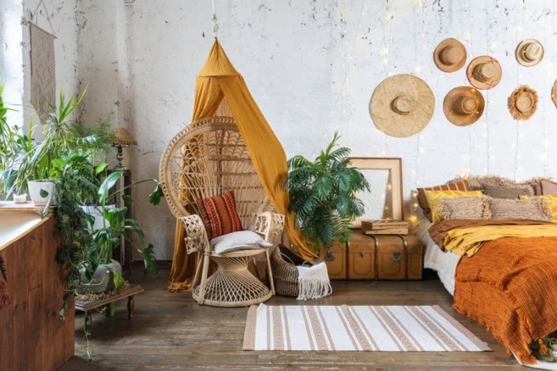 Peacock Accent Chair with Straw Hat Gallery Wall Decor