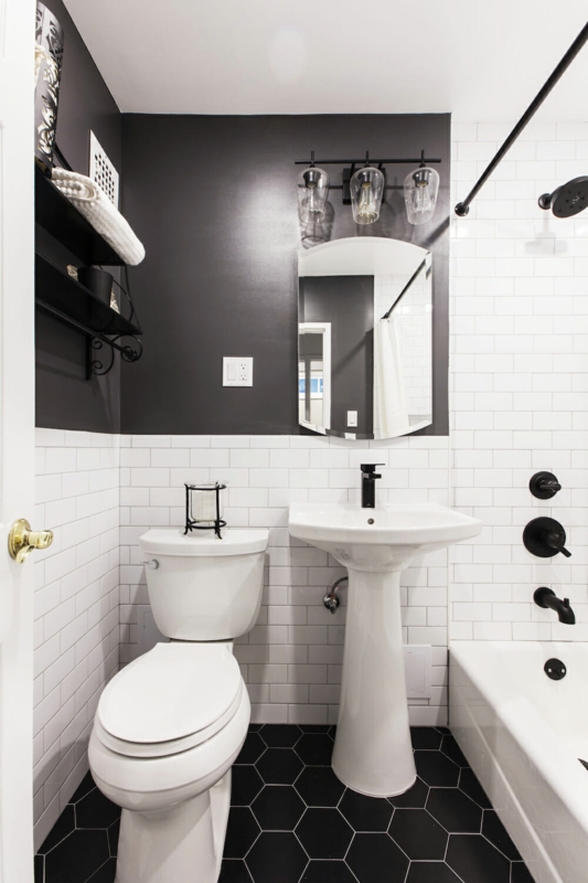 Pedestal Sink in Small Bathroom with Charcoal Upper Walls