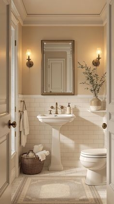 Pedestal Sink with Subway Tile Wainscoting & Beige Walls in Traditional Bath