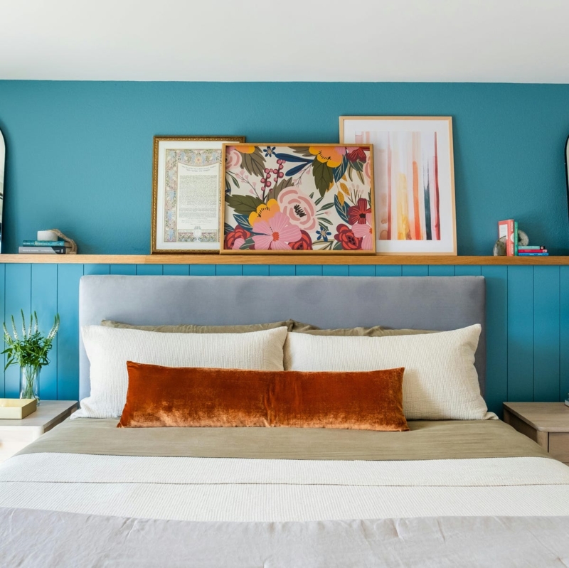 Picture Ledge: Teal Accent Wall with Velvet Orange Bolster Pillow