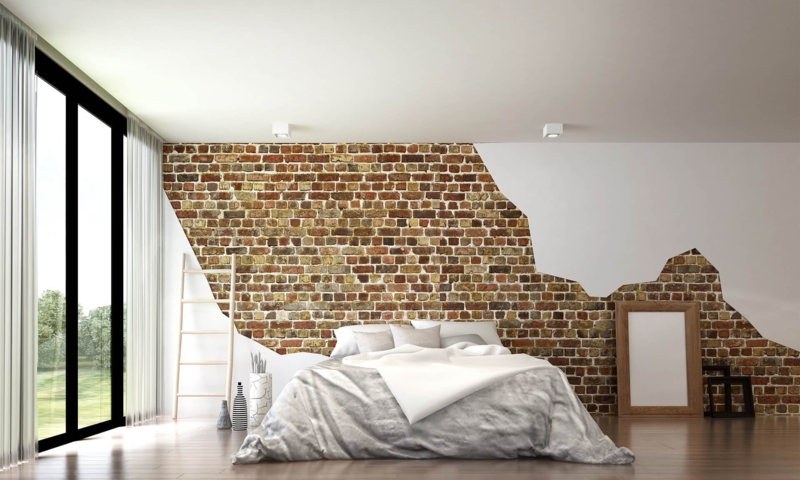 Platform Bed against Jagged Plaster & Brick Accent Wall