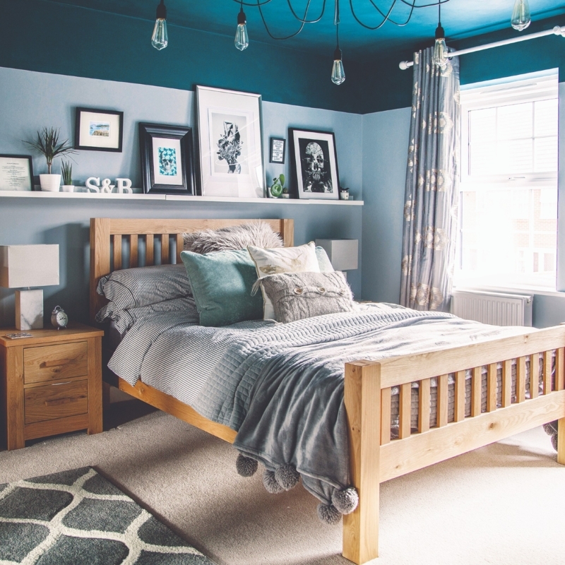 Platform Bed with Floating Shelf and Industrial Bulb Cluster Lighting