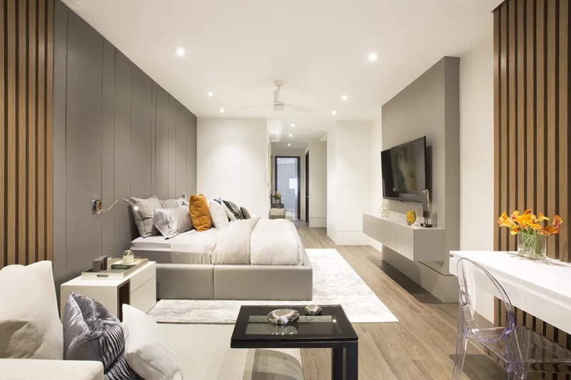 Platform Bed with Gray and Wood Slat Wall and Floating Media Unit