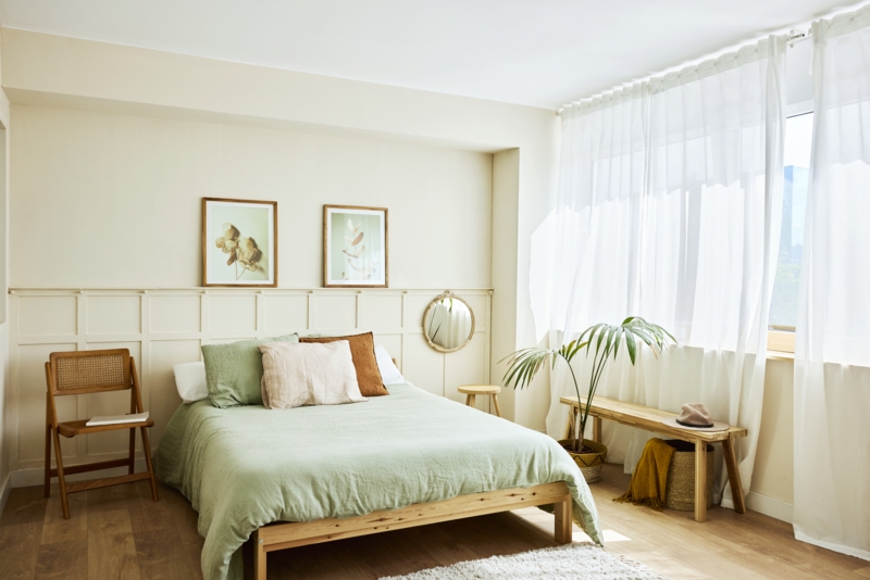Platform Bed with Grid Wainscoting Wall and Minimalist Sage Green Decor