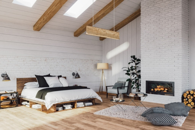 Platform Bed with Underbed Storage and White Brick Fireplace
