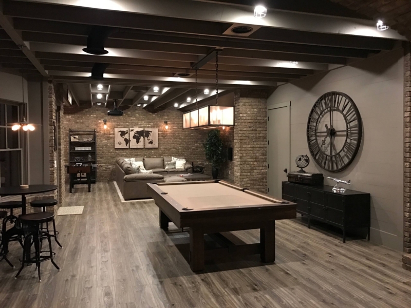 Pool Table Recreation Room with Large Wall Clock and Exposed Beams