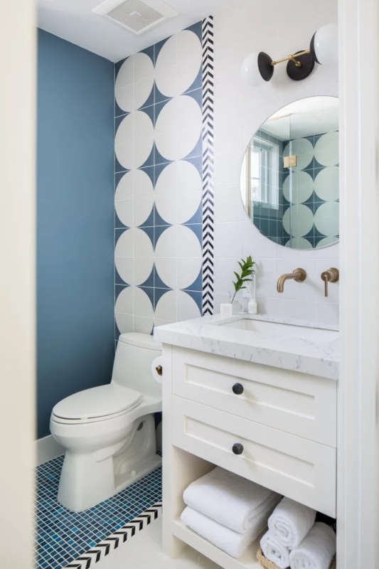 Powder Room Bold Geometric Tile with Open Shelf Vanity and Brass