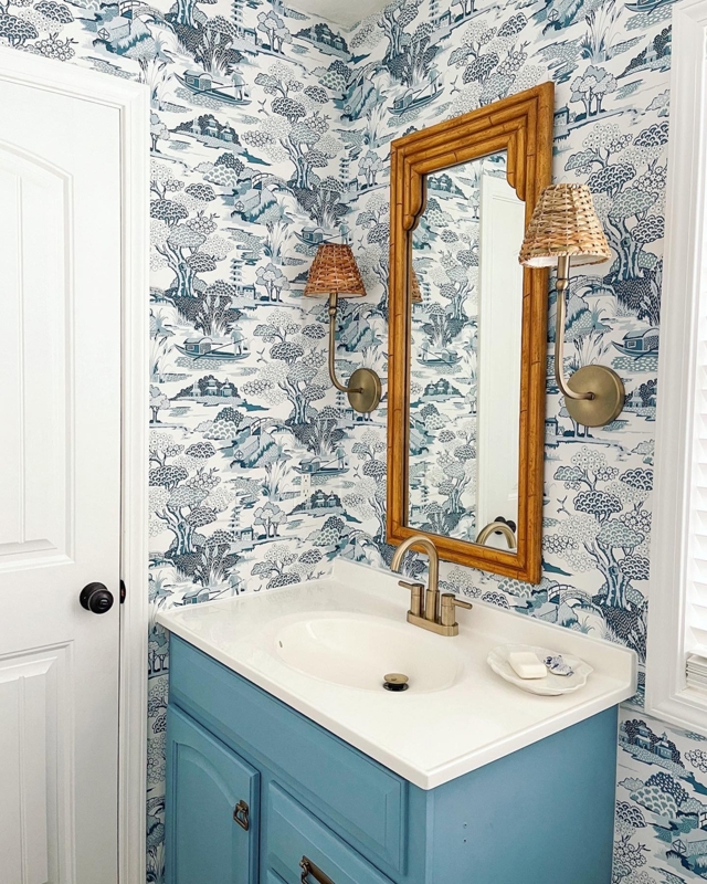Powder Room Vanity with Bamboo Frame Mirror and Wicker Sconce Shades