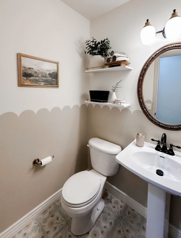 Powder Room with Scalloped Wall Paint and Patterned Floor Tiles