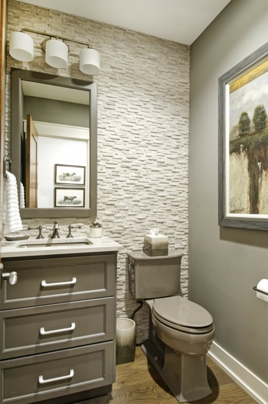 Powder Room with Stacked Stone Accent Wall and Gray Vanity