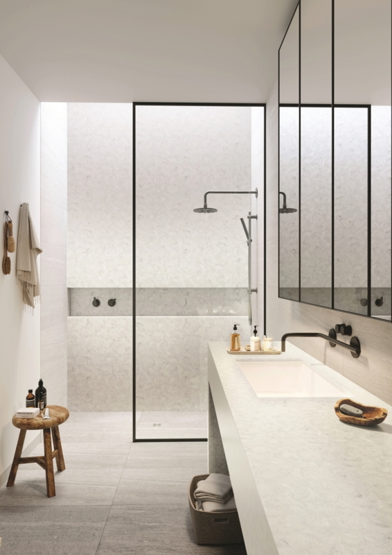Primary Bathroom with Integrated Stone Vanity and Matte Black Fixtures