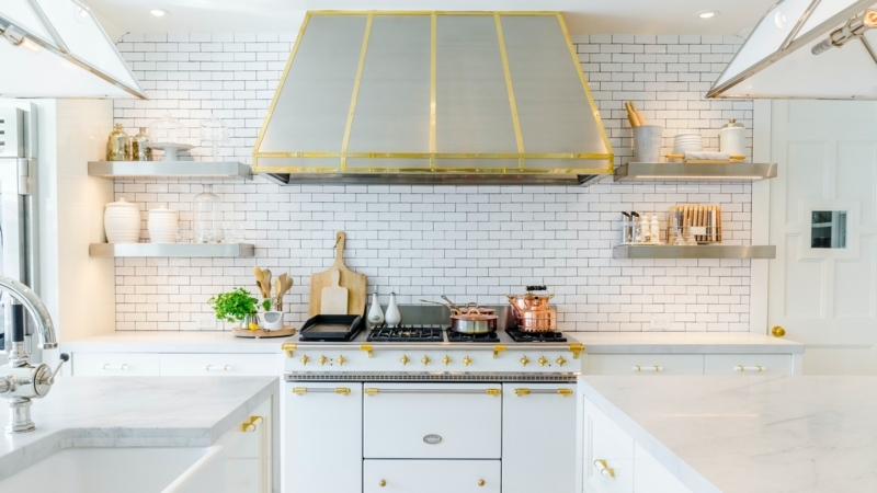 Professional White and Gold Range with Custom Hood and Open Shelving