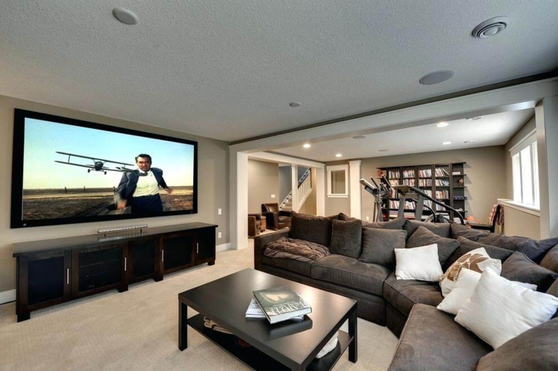 Projection Screen Home Theater in Open Concept Basement Lounge