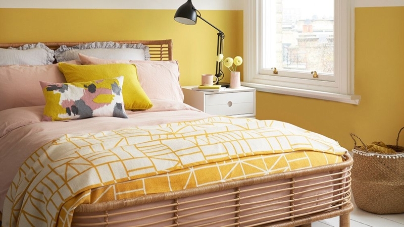Rattan Bed Frame with Ochre Color-Blocked Wall