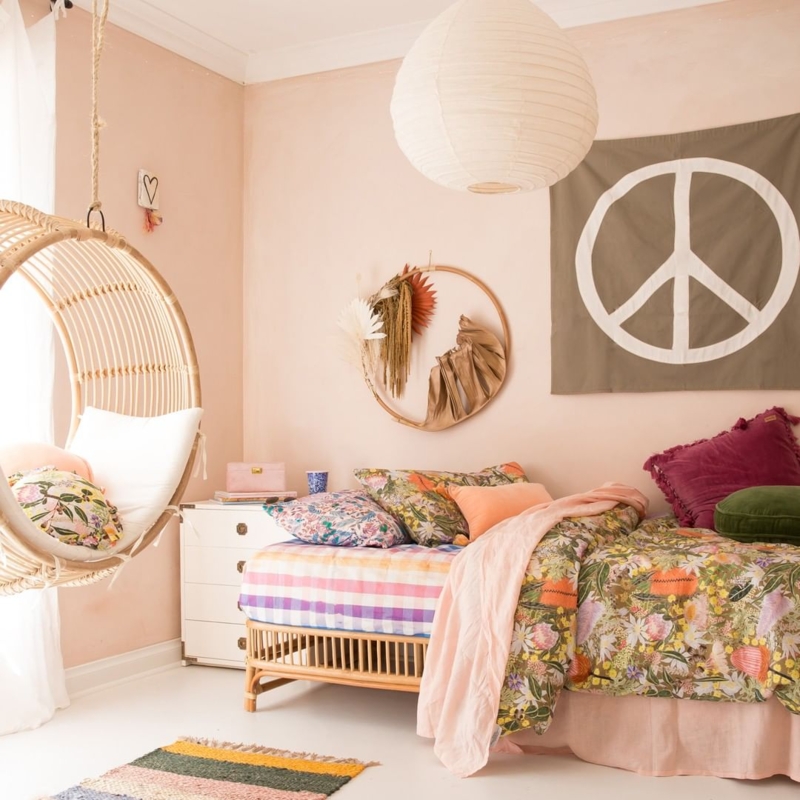 Rattan Hanging Chair and Platform Bed in Peach Bedroom
