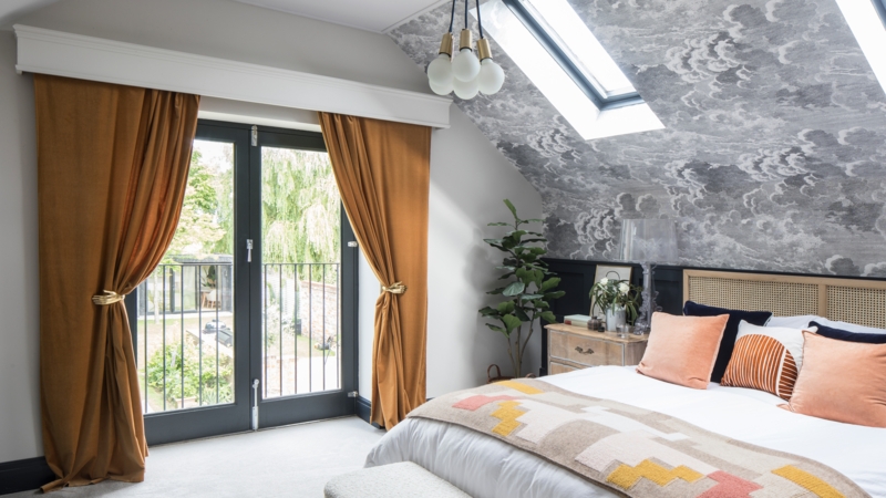 Rattan Headboard Bed, Cloud Pattern Ceiling, Mustard Velvet Curtains