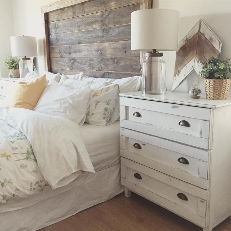 Reclaimed Wood Headboard with Distressed Dresser and Glass Base Lamps