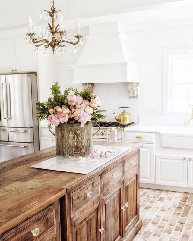 Reclaimed Wood Kitchen Island with Marble Inlay and Brick Flooring
