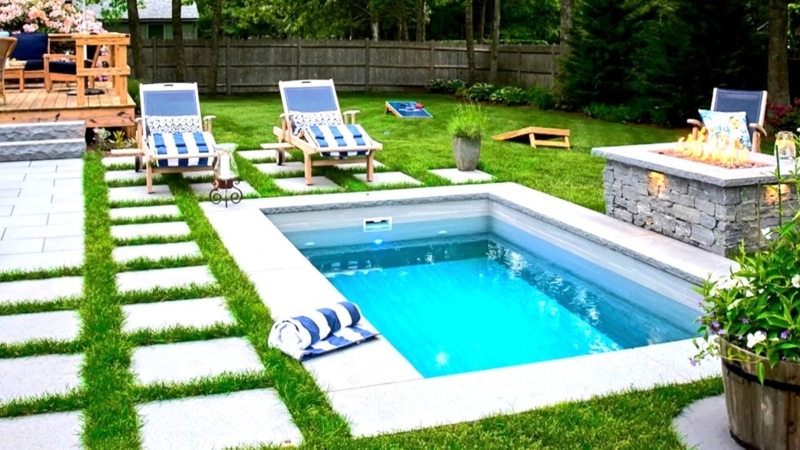 Rectangular Plunge Pool with Stone Paver Grid and Fire Pit